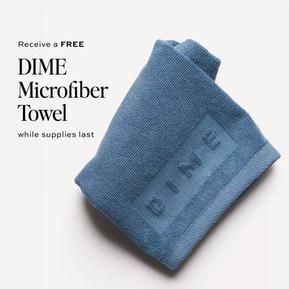 Blue microfiber towel folded and displayed on white background.