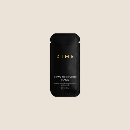 Black sachet pouch labeled "DIME Dewy Recovery Mask" with gold text, 0.17 oz sample size.
