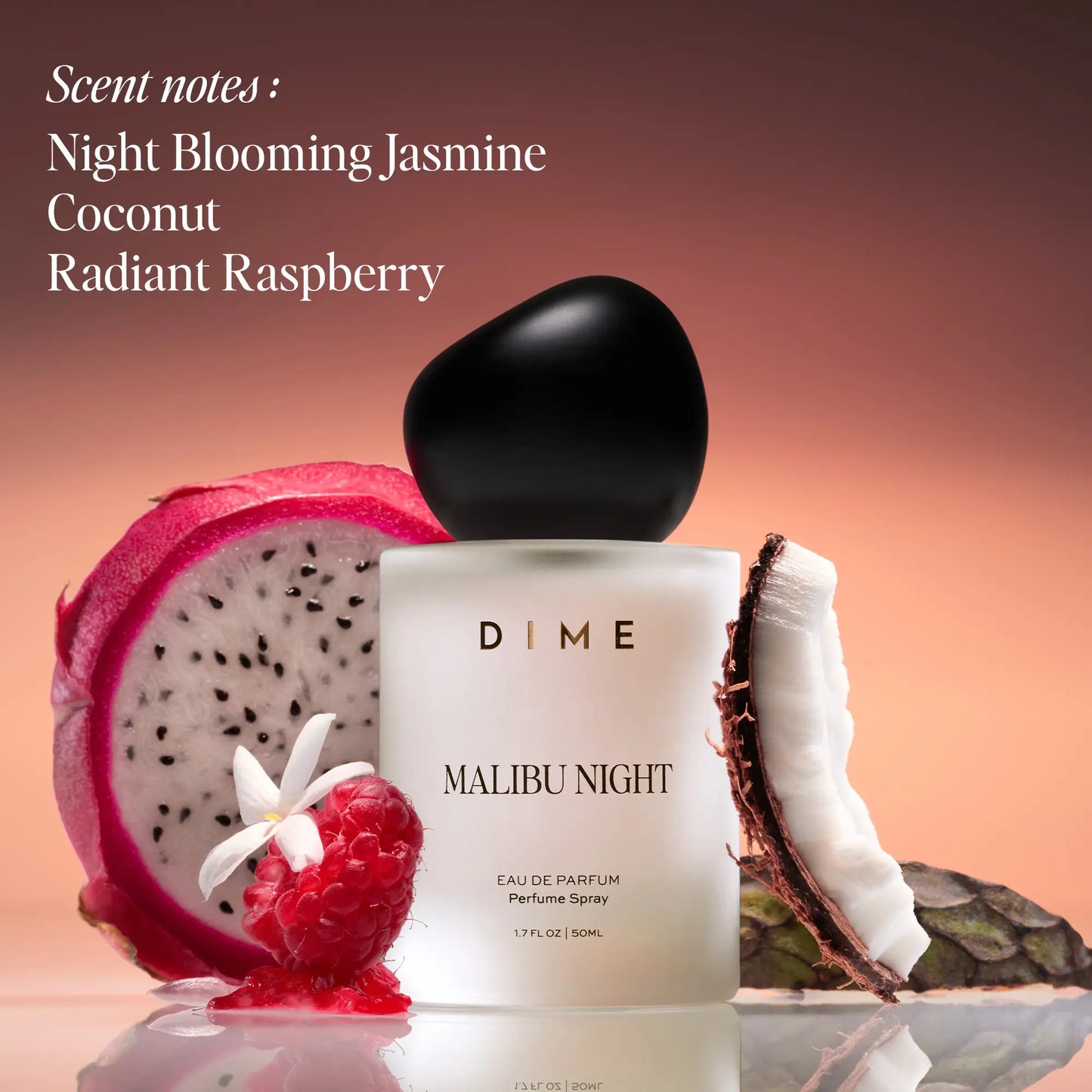 White cylindrical perfume bottle with black cap surrounded by dragon fruit, raspberry, jasmine flower, and coconut elements a