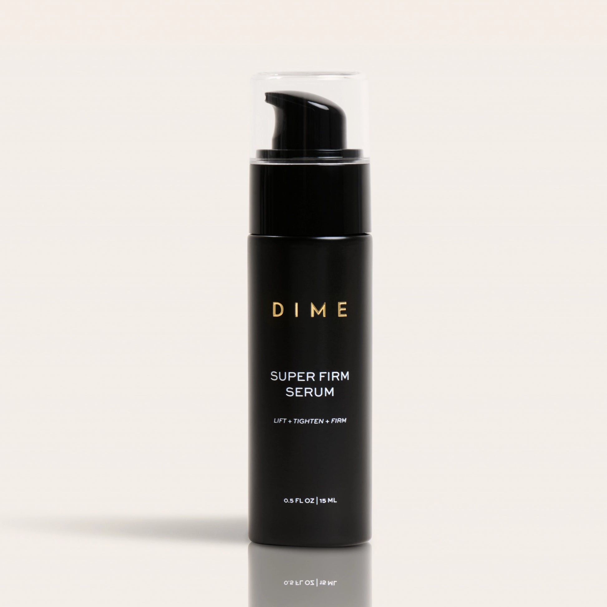 Black cylindrical pump bottle labeled "DIME Super Firm Serum" with clear top cap, 0.5 FL OZ size.