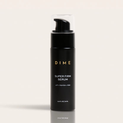 Black cylindrical pump bottle labeled "DIME Super Firm Serum" with clear top cap, 0.5 FL OZ size.