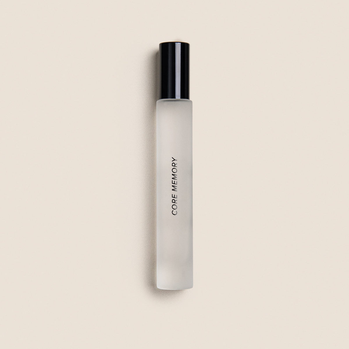 White cylindrical roller with black cap labeled "CORE MEMORY" on beige background.